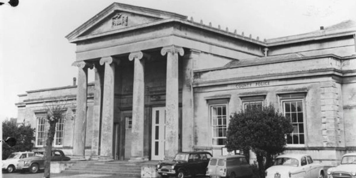 Front of the Assize Court building and County Police