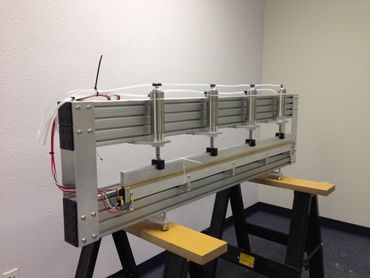 Side view of large custom sealing machine