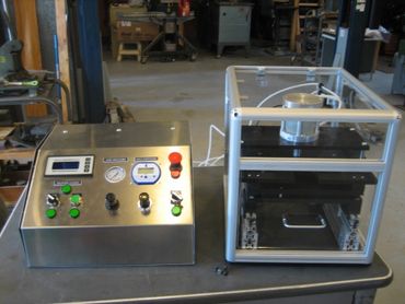 Photo of a sealer inside of a clean sealing box