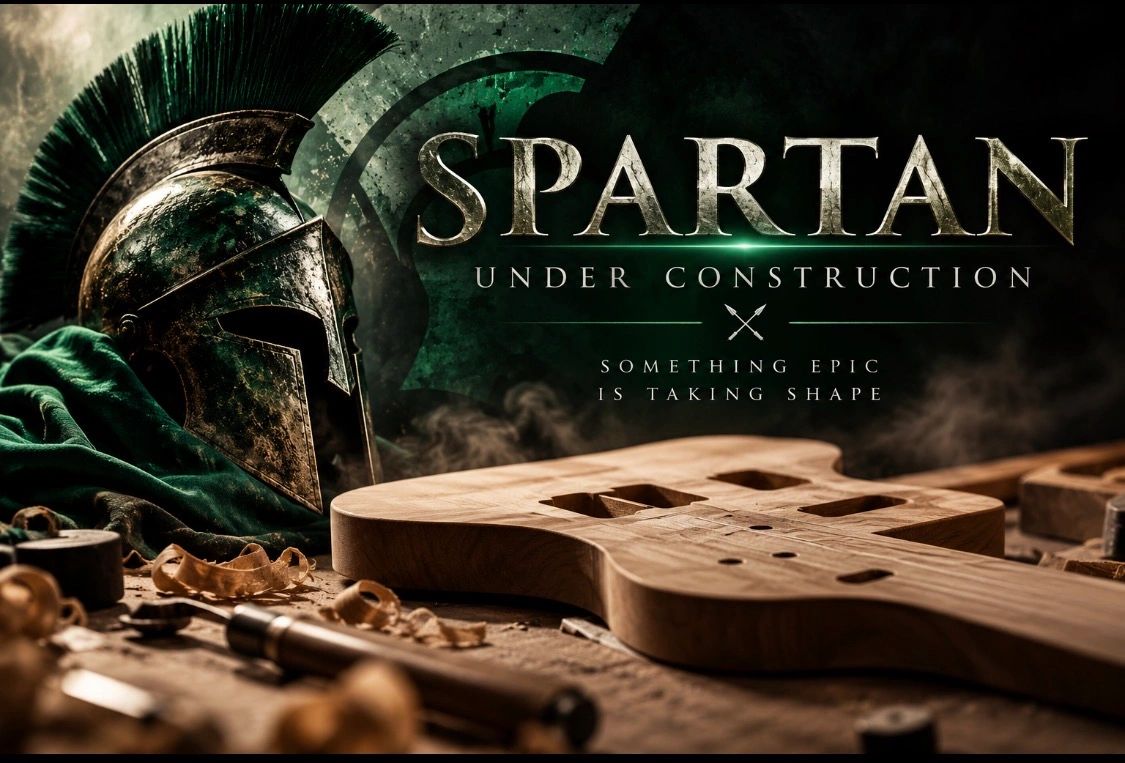 Spartan helmet with wooden guitar frame and text about construction.