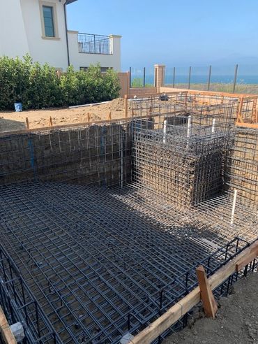 Luxury home swimming pool construction overlooking the beach