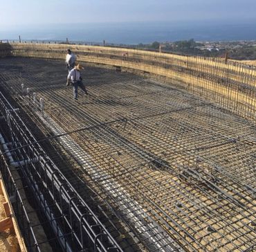 Luxury home swimming pool construction overlooking the coast