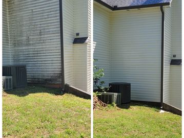 Comparison of dirty and cleaned house siding.