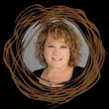 Portrait of a smiling woman with curly hair inside a brown circular frame.