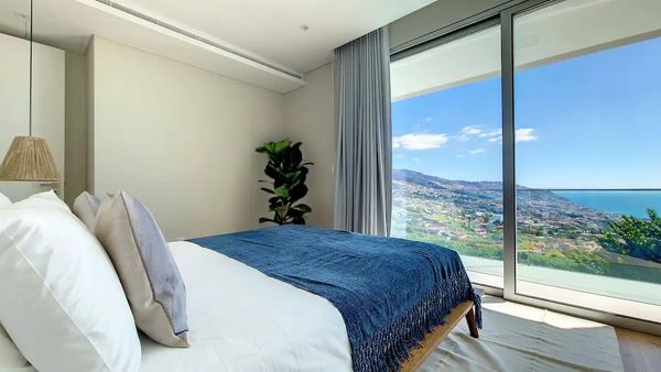 Bedroom with view of Madeira hillside