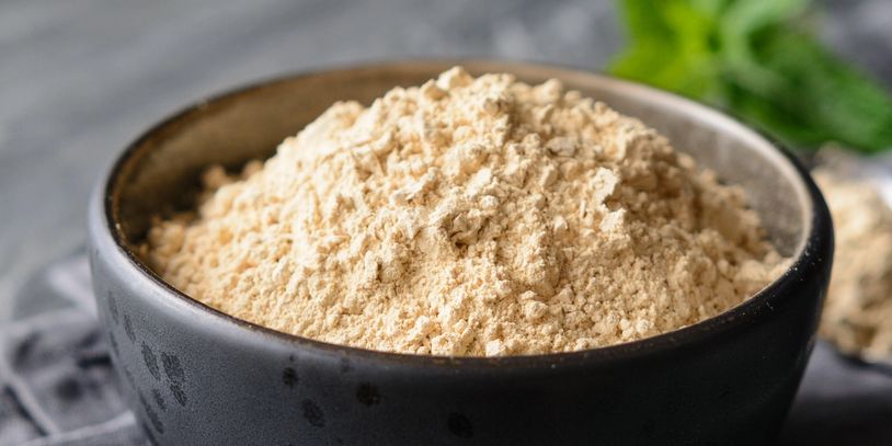 Organic Mondia whitei powder displayed on slate table