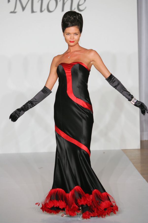 "Red Snake" style black gown with ostrich red feathers on bottom 