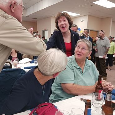 People socializing at a gathering.