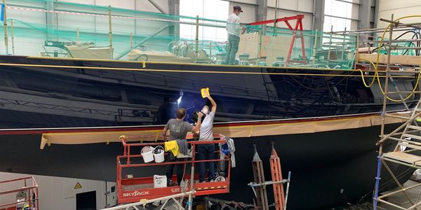 UP Group team polishing commercial coating on a yacht