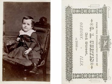 Historical photo of a toddler in an ornate chair.