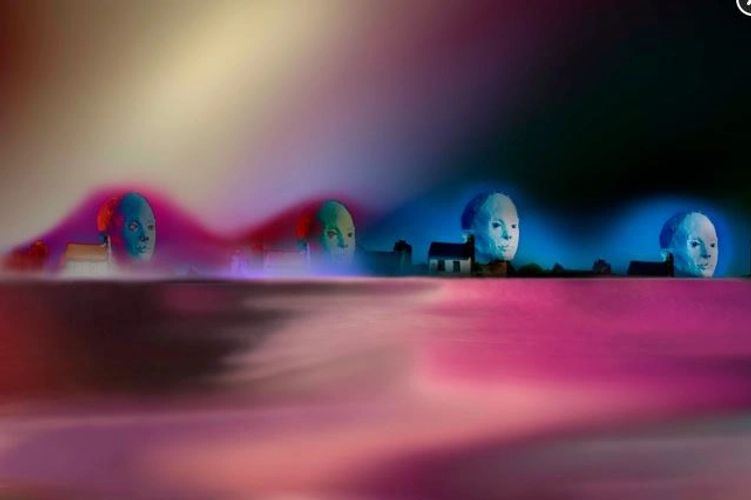 Surreal landscape with giant blue heads and small houses under colorful sky.