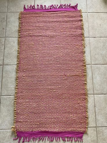 Playing with bailing twine for warp.  It piles up in the barn every year. This is one years worth in