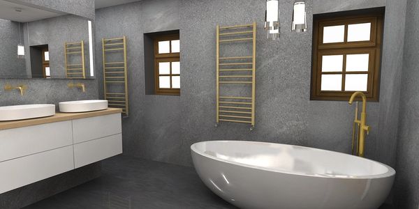freestanding bath with floor mounted mixer in brass finish