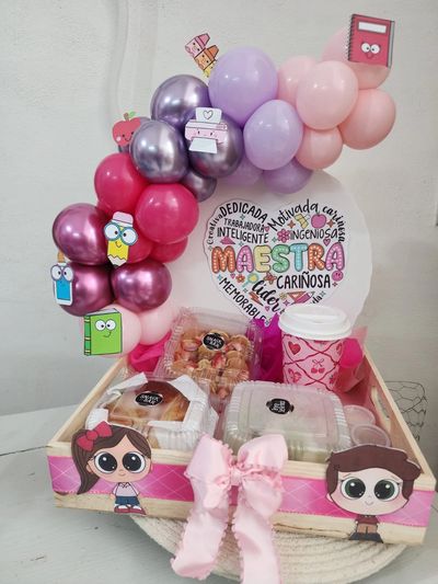 Colorful balloon and snack gift box for a beloved teacher.