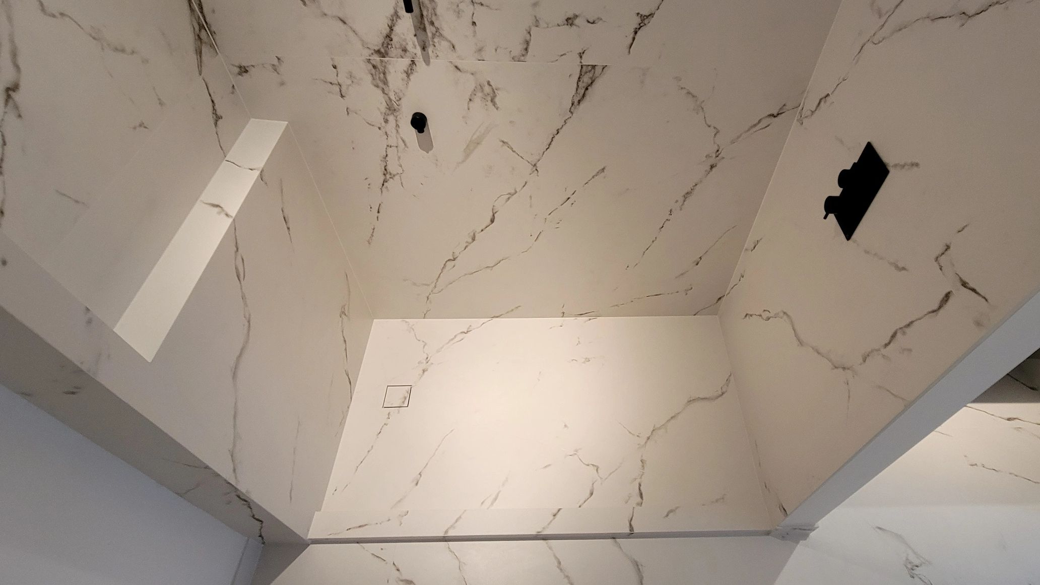 Dekton large format tile panels shower