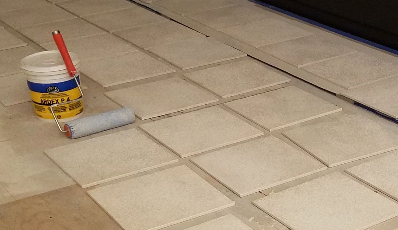Resin-backed tiles. How to install them?
