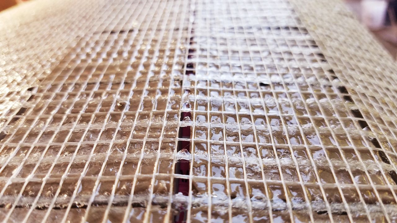 Resin-backed tiles. How to install them?