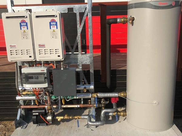 Gas-powered water heating system setup.