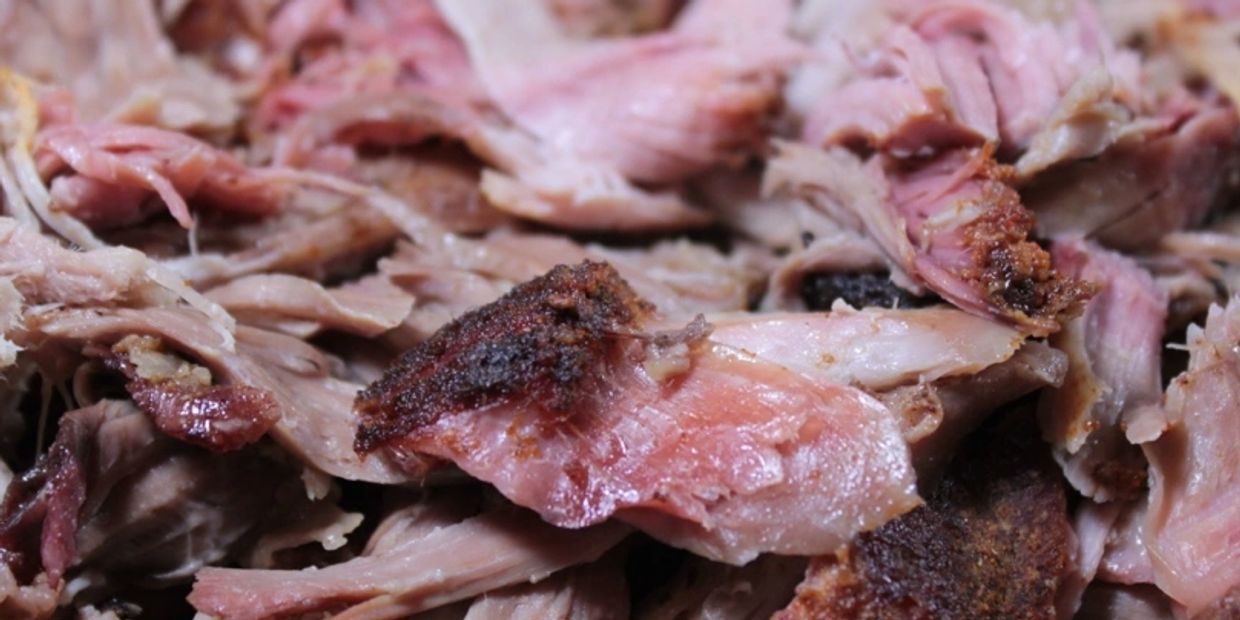Close-up of cooked pulled pork.