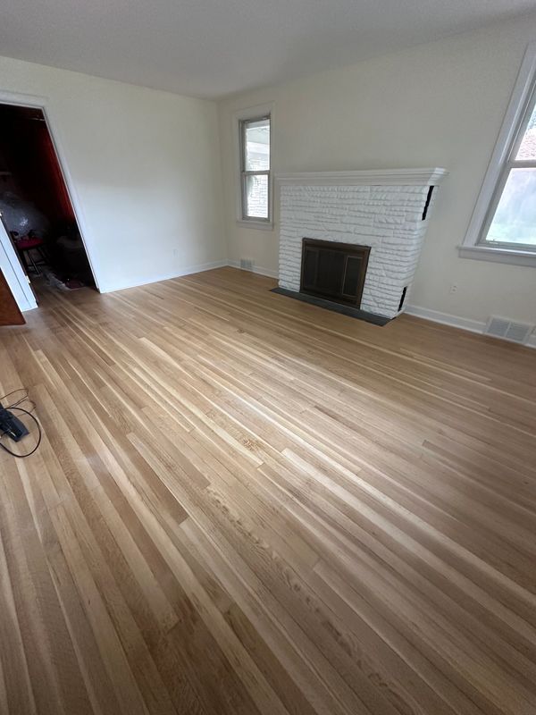 Hardwood floor refinish and baseboards