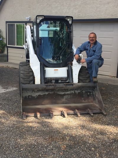 Thomas Thurnheer with a skid steer.