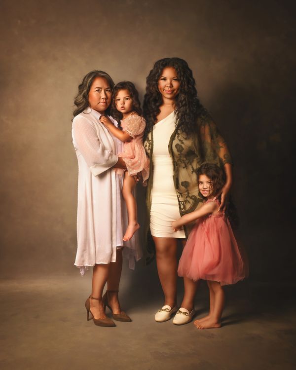 a three generations portrait of the woman in the family