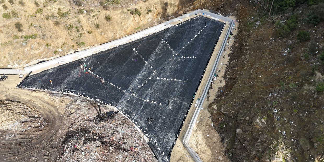 A waste cell with HDPE liner installed to seal contaminants in.