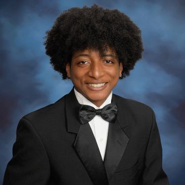 Male student smiling for portrait