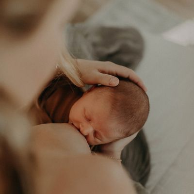 Mother breastfeeding a baby