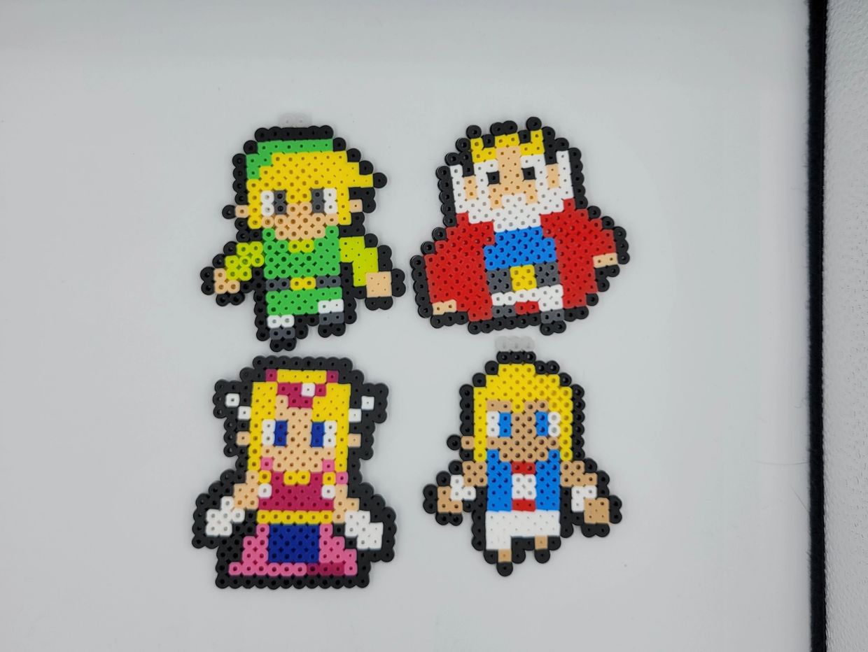 Legend of Zelda Pixel Art Keychains Including Link Zelda, King Daphnes and Tetra from Wind Waker.