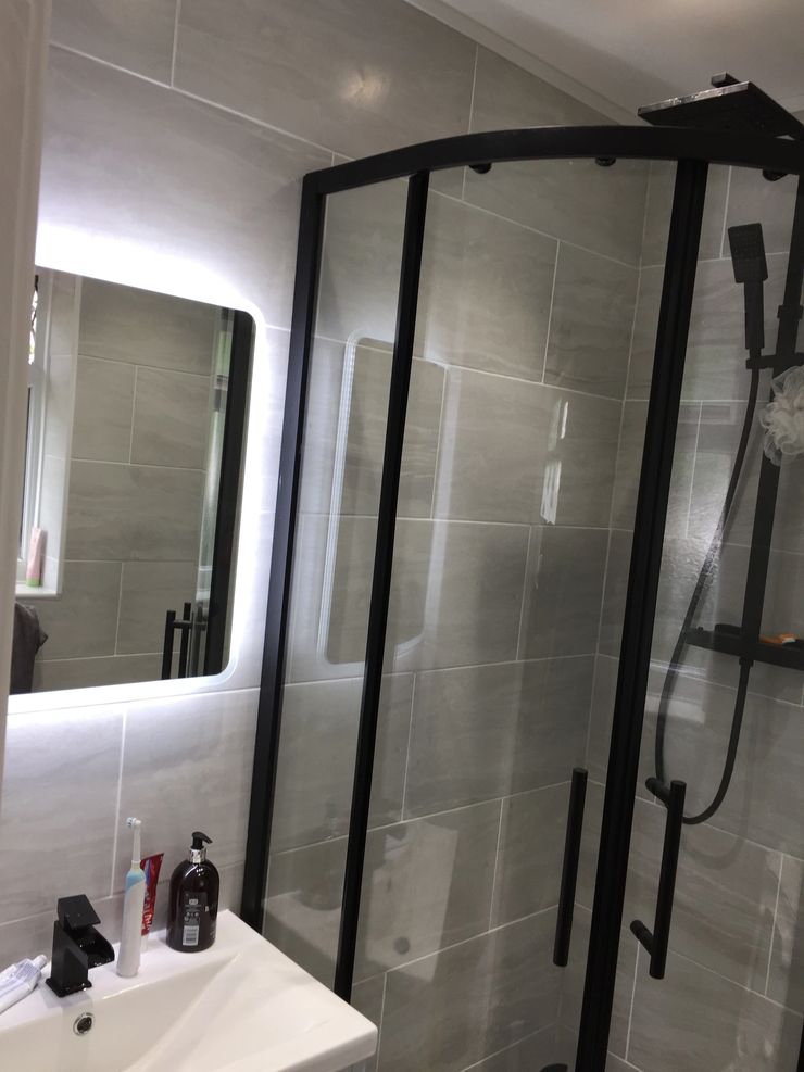 Bathroom refurbishment with new tiling and sanitary ware in Bolton