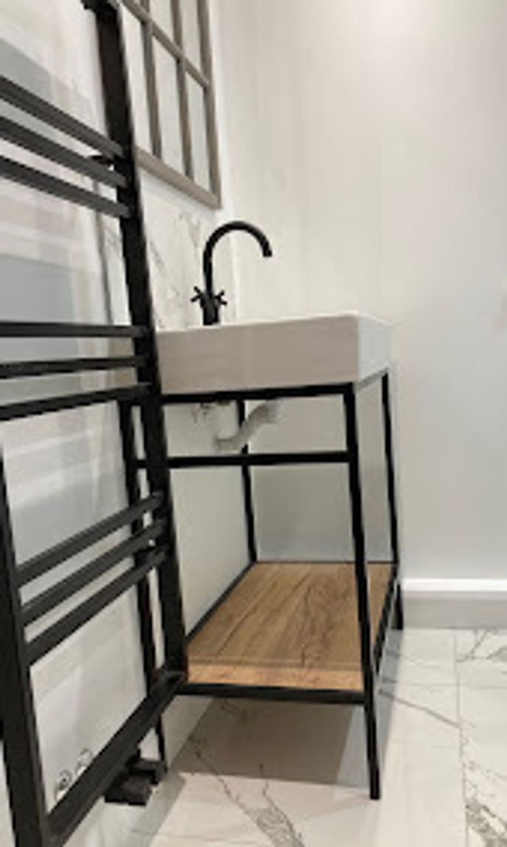 Modern bathroom renovation completed by IK Master Build Ltd in Bolton