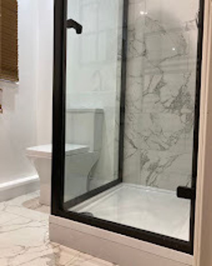 Contemporary bathroom remodel with walk-in shower in Manchester