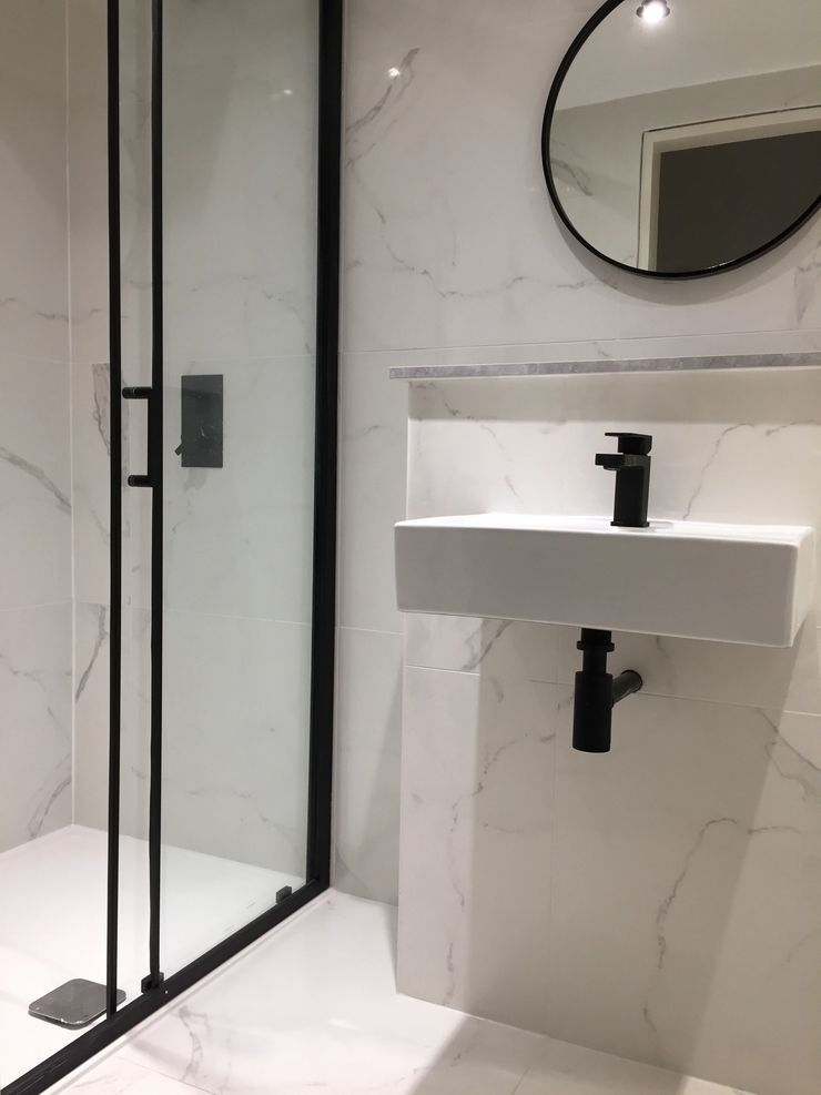 Modern bathroom suite with vanity unit installed in Manchester