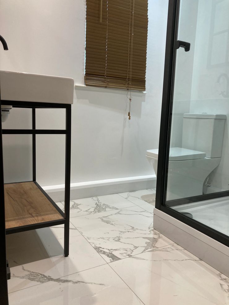 New bathroom suite with shower over bath fitted in Greater Manchester