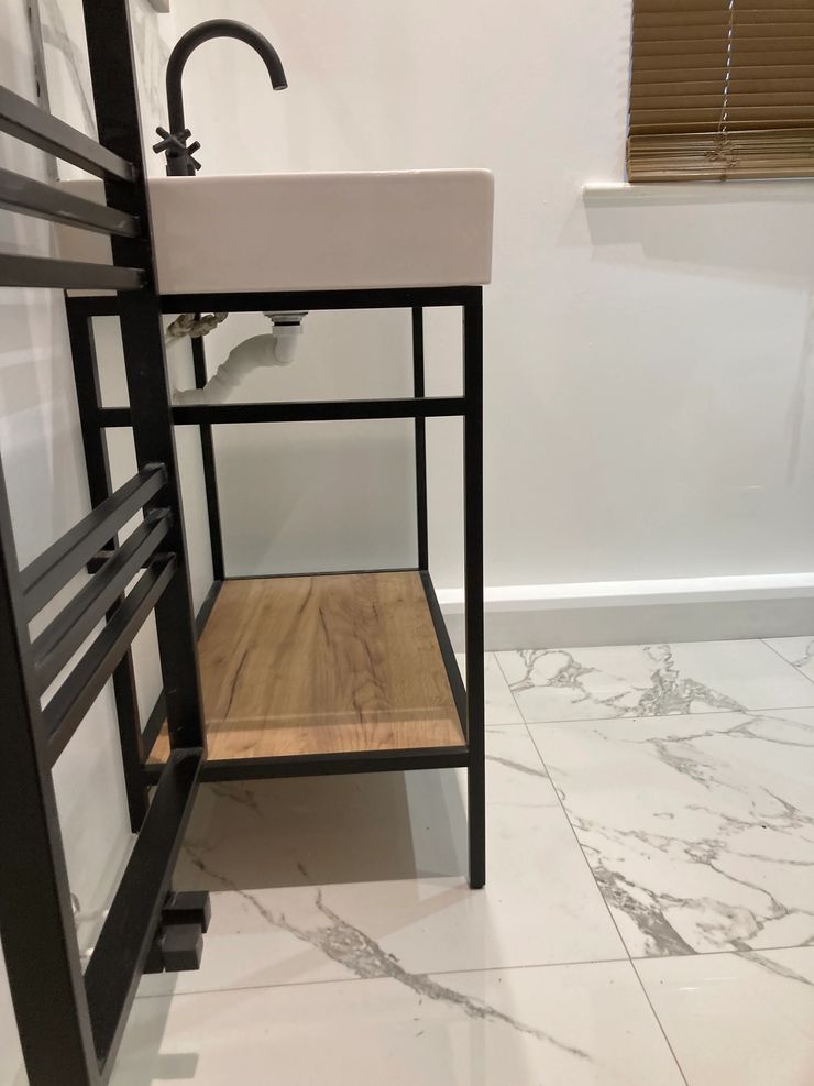 Complete bathroom installation with floor-to-ceiling tiles in Bolton