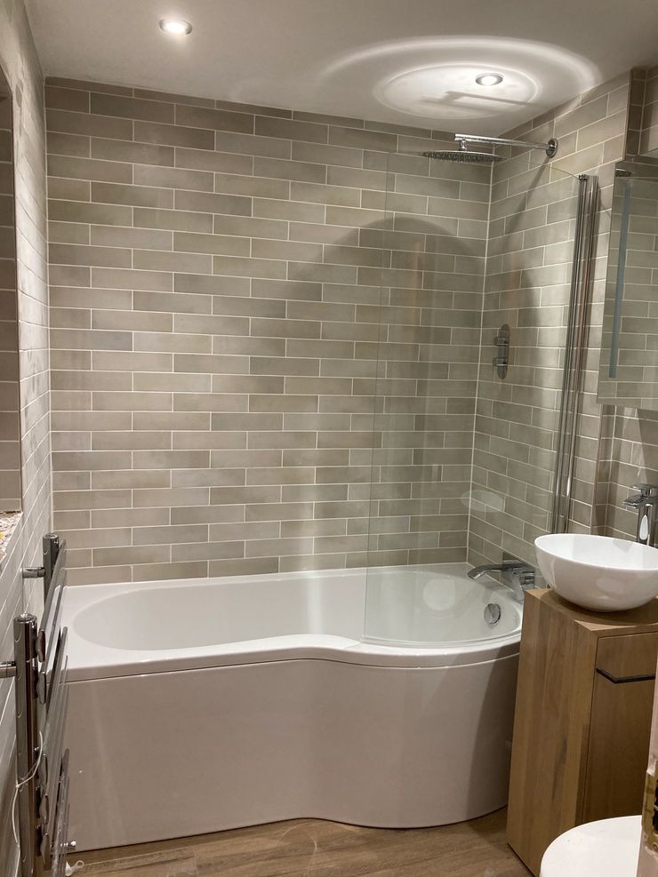 Contemporary bathroom remodel by IK Master Build Ltd in Manchester