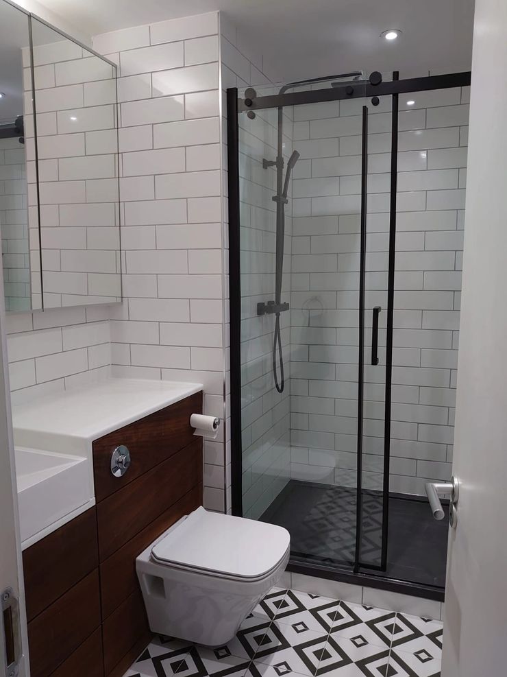 Bathroom remodel with large format tiles fitted in Bolton by IK Master Build Ltd
