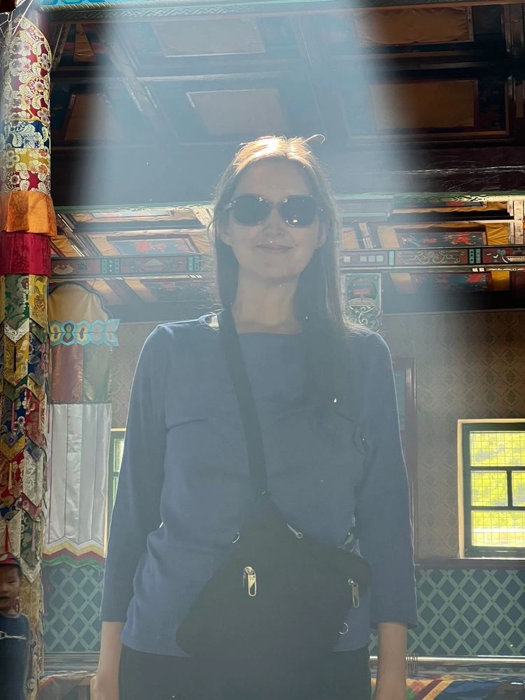 Photo credit: Telo Tulku Rinpoche
Image is the author standing  in a beam of light