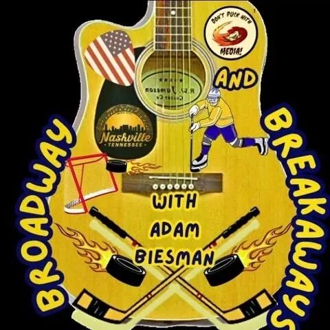 Acoustic guitar decorated with hockey and Nashville-themed stickers for a show with Adam Biesman.