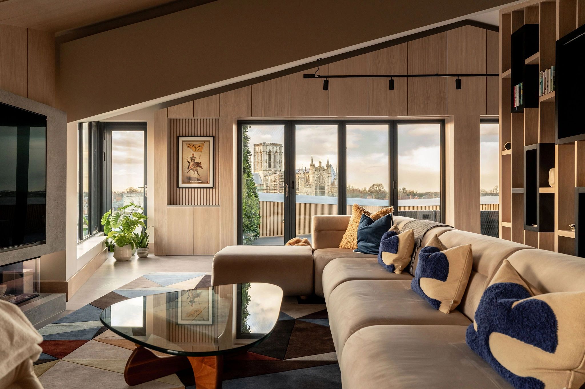 lounge corner unit sofa, bespoke wall units and cabinets , feature ceiling. Penthouse apartment in  