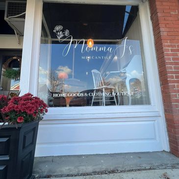 Storefront window of Momma J's