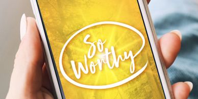 So Worthy app, Self-esteem, Self-Confidence, Self-respect, holding a cell phone.