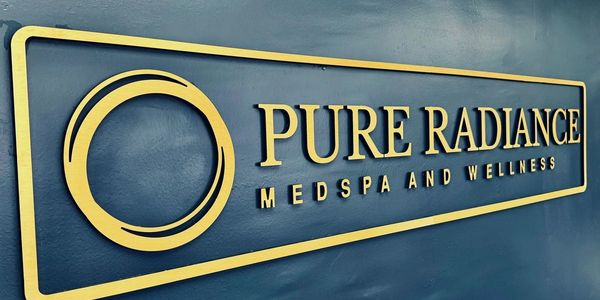 Logo sign for Pure Radiance MedSpa and Wellness