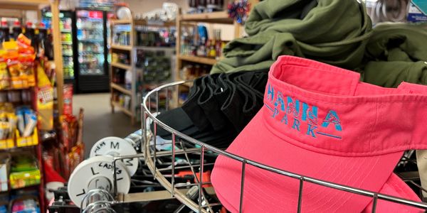 Hanna Park souvenir visor with the campground store in the background