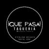 Logo of ¡Que Pasa! Taqueria with a circular design and bold text.