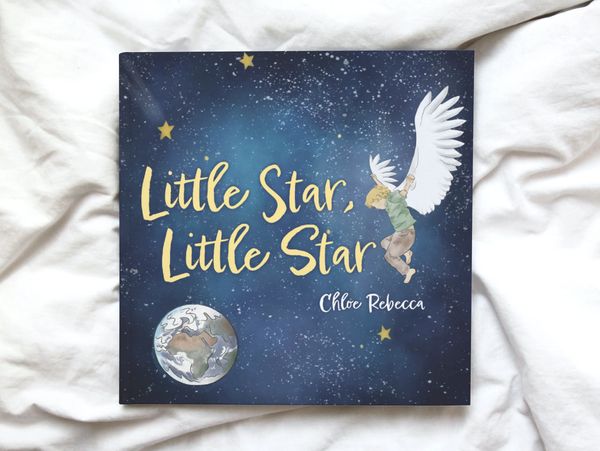 Children's book titled Little Star, Little Star set on top of a blanket