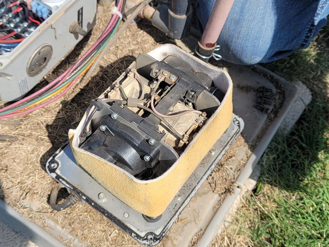 Man preforming septic maintenance 