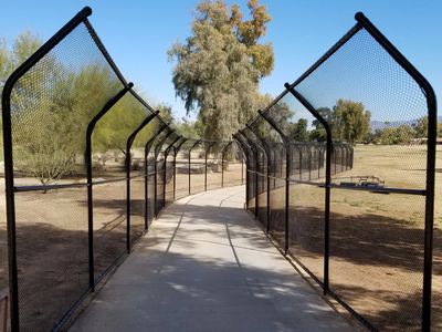 Golf Cart Path protection netting, black polyester 7/8" netting on black steel structure