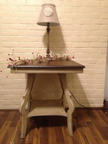 Antique table with gel stained top and painted/glazed bottom.